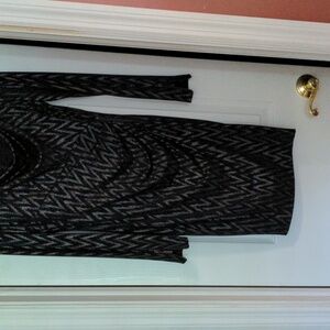 Cashe long sleeve dress with scoop neckline.